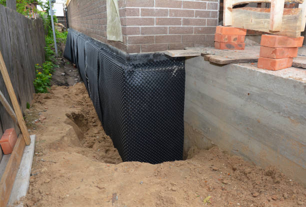 SJ Waterproofing Pros technician performing targeted Foundation Crack Repair assessment in Doylestown, PA